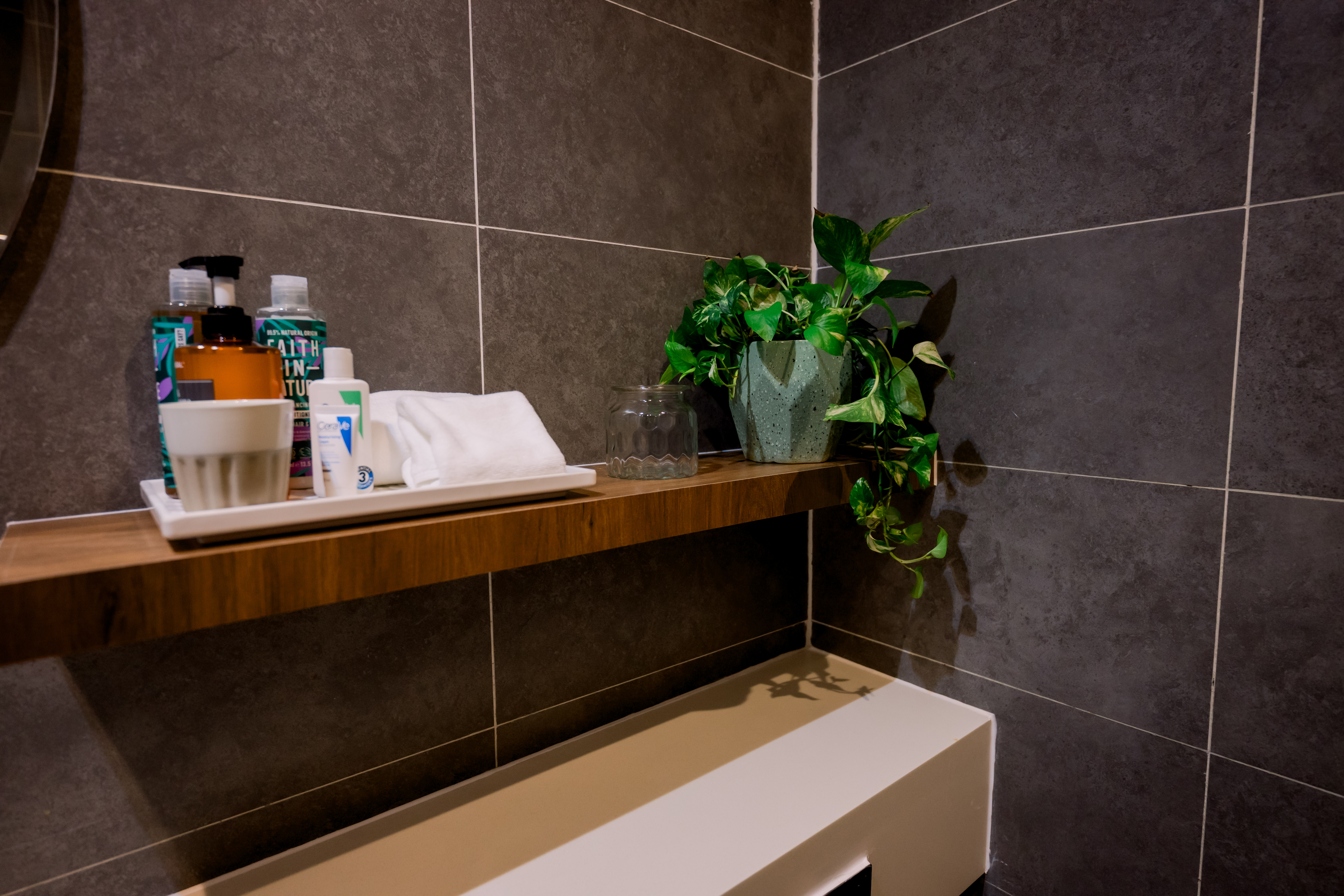 Bathroom shelf with amenities